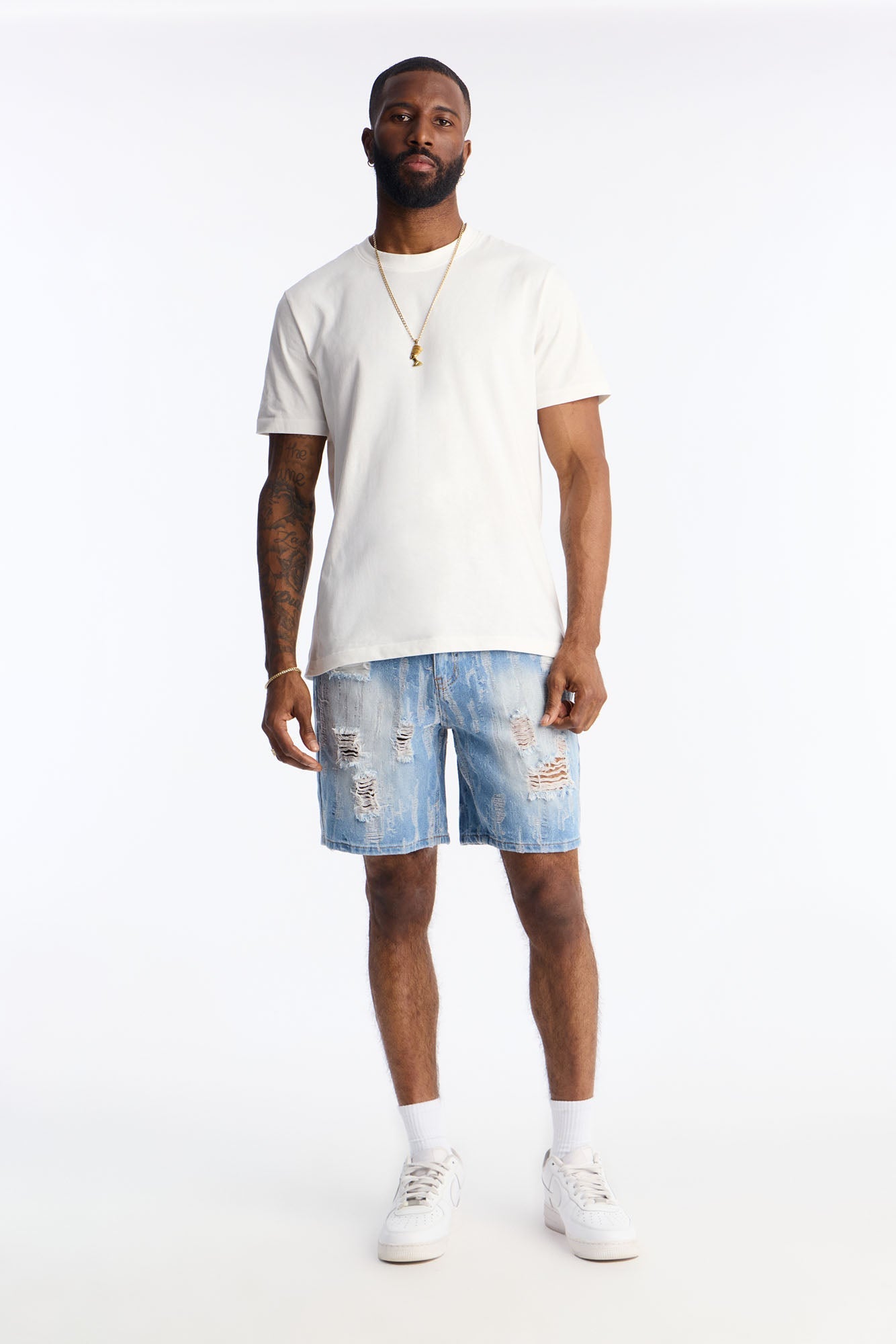 Relaxed All Over Distressed Denim Short - Medium Wash